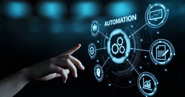 A hand reaching toward a digital interface displaying the word AUTOMATION surrounded by icons symbolizing data, workflow, settings, analytics, and technology on a dark, futuristic background.
